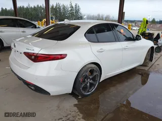 2018 Alfa Romeo Giulia Ti with VIN ZARFAECNXJ7574745, listed as a IAAI auction lot 41809543 with 69,372 mi miles. Bid and sale history available at carsss.com. Image 4.