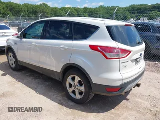 2014 Ford Escape SE with VIN 1FMCU9G94EUB01239, listed as a IAAI auction lot 42628460 with 122,032 mi miles and . Bid and sale history available at DreamBid. Image 3.