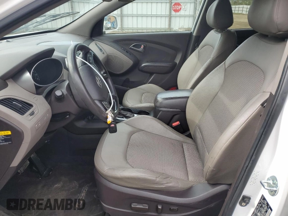 2015 Hyundai Tucson GLS with VIN KM8JT3AF0FU039863, listed as a Copart auction lot 51347815 with 104,469 mi miles and Salvage Title. Bid and sale history available at DreamBid. Image 7.