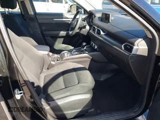 2017 Mazda CX-5 Sport with VIN JM3KFABL5H0141895, listed as a IAAI auction lot 41718108 with 69,312 mi miles. Bid and sale history available at carsss.com. Image 5.