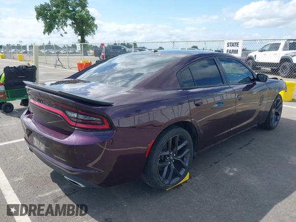 2022 Dodge Charger SXT with VIN 2C3CDXBG4NH208748, listed as a IAAI auction lot 41916434 with 54,053 mi miles and . Bid and sale history available at DreamBid. Image 4.