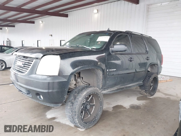 2007 GMC Yukon SLE w/3SA with VIN 1GKFC13C27R307371, listed as a IAAI auction lot 41569424 with 355,074 mi miles. Bid and sale history available at carsss.com. Image 2.