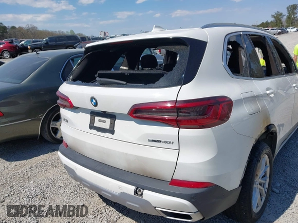 2020 BMW X5 sDrive40i with VIN 5UXCR4C08L9C07579, listed as a IAAI auction lot 41871208 with Not Provided miles and . Bid and sale history available at DreamBid. Image 14.