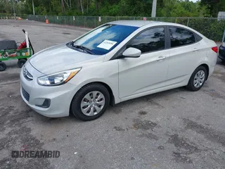 2016 Hyundai Accent SE z VIN KMHCT4AE4GU110456, wystawiony jako IAAI lot #42203494 z przebiegiem 97 409 mil mil oraz . Historia ofert i sprzedaży dostępna na DreamBid. Obrazek 2.