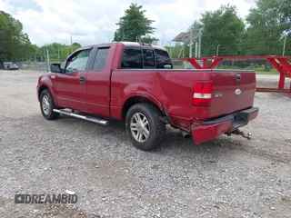 2005 Ford F-150 XLT with VIN 1FTRX12565KD56157, listed as a IAAI auction lot 42244120 with 230,357 mi miles and . Bid and sale history available at DreamBid. Image 3.