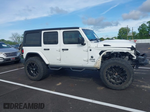 2020 Jeep Wrangler Unlimited Sport S with VIN 1C4HJXDN6LW198065, listed as a IAAI auction lot 42049279 with 72,512 mi miles. Bid and sale history available at carsss.com. Image 13.