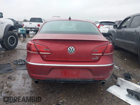 2013 Volkswagen CC VR6 Executive 4Motion with VIN WVWGU7AN9DE561506, listed as a IAAI auction lot 41459074 with 70,128 mi miles. Bid and sale history available at carsss.com. Image 15.