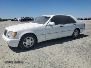1997 Mercedes-Benz S-Class with VIN WDBGA33G2VA340711, listed as a Copart auction lot 52647695 with 90,224 mi miles and Salvage Title. Bid and sale history available at carsss.com. Image 1.