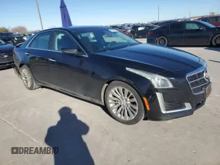 2014 Cadillac CTS Performance RWD with VIN 1G6AS5SX7E0184479, listed as a Copart auction lot 87076074 with 121,927 mi miles and Clean title. Bid and sale history available at DreamBid. Image 4.