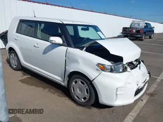 2014 Scion xB with VIN JTLZE4FE6EJ058588, listed as a IAAI auction lot 41736424 with 134,017 mi miles. Bid and sale history available at carsss.com. Image 1.