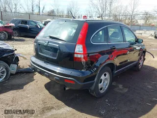 2007 Honda CR-V LX with VIN JHLRE48307C072357, listed as a IAAI auction lot 41850670 with 199,479 mi miles. Bid and sale history available at carsss.com. Image 4.