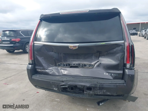2017 Cadillac Escalade Premium Luxury with VIN 1GYS4CKJ9HR161307, listed as a IAAI auction lot 41304055 with 114,660 mi miles. Bid and sale history available at carsss.com. Image 16.