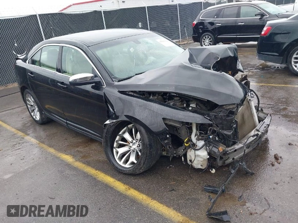 2014 Ford Taurus Limited with VIN 1FAHP2F87EG130532, listed as a IAAI auction lot 41618112 with 118,474 mi miles. Bid and sale history available at carsss.com. Image 1.