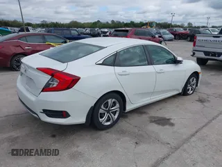 2020 Honda Civic LX with VIN 2HGFC2F69LH521681, listed as a IAAI auction lot 41664332 with 37,038 mi miles and . Bid and sale history available at DreamBid. Image 4.