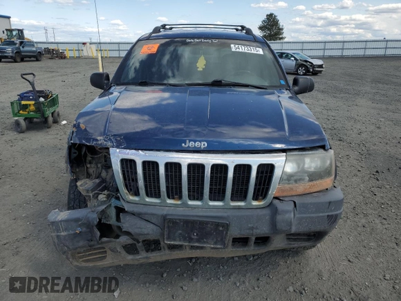 2000 Jeep Grand Cherokee Laredo z VIN 1J4GW48S2YC154627, wystawiony jako Copart lot #54173315 z przebiegiem 251 666 mil mil oraz Szkoda całkowita • Salvage title. Historia ofert i sprzedaży dostępna na DreamBid. Obrazek 5.
