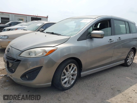 2012 Mazda 5 Grand Touring z VIN JM1CW2DL1C0126545, wystawiony jako IAAI lot #42301130 z przebiegiem 151 212 mil mil oraz . Historia ofert i sprzedaży dostępna na DreamBid. Obrazek 2.