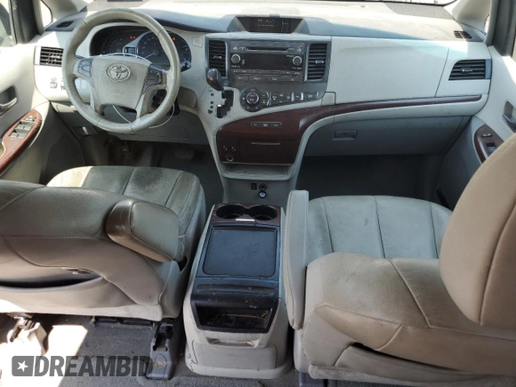 2012 Toyota Sienna XLE AAS with VIN 5TDYK3DC3CS237344, listed as a Copart auction lot 63271815 with 105,860 mi miles and Salvage title. Bid and sale history available at DreamBid. Image 8.