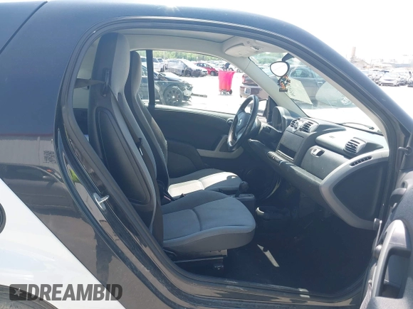 2009 Smart fortwo Pure with VIN WMEEJ31XX9K302737, listed as a IAAI auction lot 42124550 with 43,610 mi miles and . Bid and sale history available at DreamBid. Image 5.