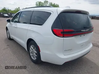 2022 Chrysler Pacifica Touring L with VIN 2C4RC1BG5NR170186, listed as a IAAI auction lot 41422057 with 71,204 mi miles and . Bid and sale history available at DreamBid. Image 3.