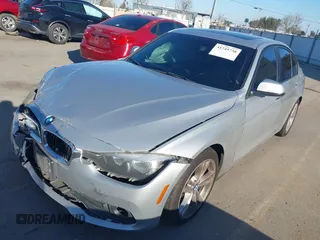 2016 BMW 3 Series 320i with VIN WBA8E1G56GNT99650, listed as a IAAI auction lot 41745738 with 191,326 mi miles and . Bid and sale history available at carsss.com. Image 2.