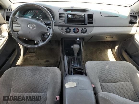 2002 Toyota Camry LE z VIN JTDBE32K120068644, wystawiony jako Copart lot #61168915 z przebiegiem 210 149 mil mil oraz Czysty tytuł • Clean title. Historia ofert i sprzedaży dostępna na DreamBid. Obrazek 8.