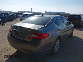 2012 Infiniti M37 with VIN JN1BY1AP0CM335181, listed as a IAAI auction lot 41563791 with 110,316 mi miles. Bid and sale history available at carsss.com. Image 4.