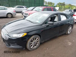 2017 Ford Fusion SE z VIN 3FA6P0HD4HR338676, wystawiony jako IAAI lot #42197370 z przebiegiem 50 862 mil mil oraz . Historia ofert i sprzedaży dostępna na DreamBid. Obrazek 14.