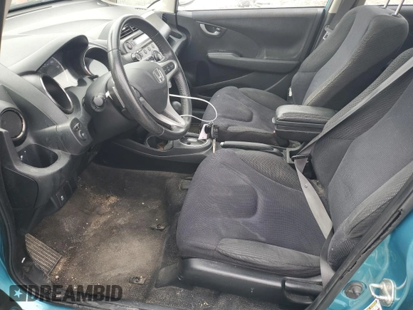 2013 Honda Fit Sport z VIN JHMGE8H56DC020352, wystawiony jako Copart lot #47624385 z przebiegiem 186 407 mil mil oraz Szkoda całkowita • Salvage title. Historia ofert i sprzedaży dostępna na DreamBid. Obrazek 7.