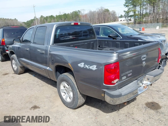 2006 Dodge Dakota SLT with VIN 1D7HW48N96S689743, listed as a IAAI auction lot 41772735 with 258,532 mi miles. Bid and sale history available at carsss.com. Image 3.