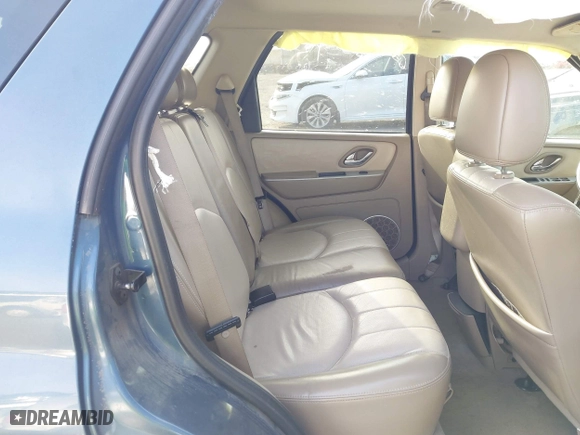 2006 Mercury Mariner Luxury with VIN 4M2CU57186DJ07953, listed as a IAAI auction lot 41756840 with 163,988 mi miles. Bid and sale history available at carsss.com. Image 8.