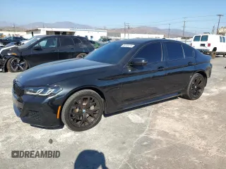 2021 BMW 5 Series 530e with VIN WBA13AG04MCF47235, listed as a Copart auction lot 69120474 with 74,779 mi miles and Salvage Title. Bid and sale history available at carsss.com. Image 1.