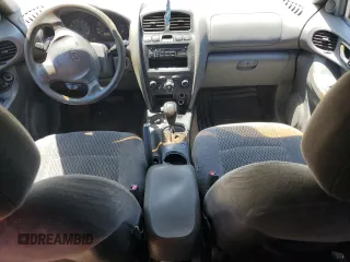 2004 Hyundai Santa Fe z VIN KM8SB12B14U711904, wystawiony jako Copart lot #58957365 z przebiegiem 214 051 mil mil oraz Szkoda całkowita • Salvage title. Historia ofert i sprzedaży dostępna na DreamBid. Obrazek 8.