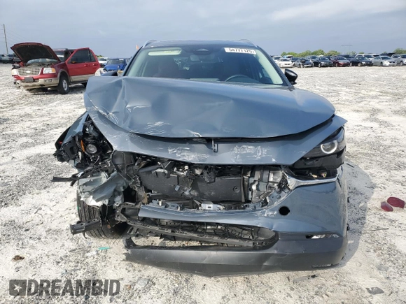 2024 Mazda CX-30 S Carbon Edition с VIN 3MVDMBCMXRM604194, выставлен на аукционе Copart как лот 54777125 с пробегом 9 816 миль миль и Списание • Salvage title. История ставок и продаж доступна на DreamBid. Изображение 5.