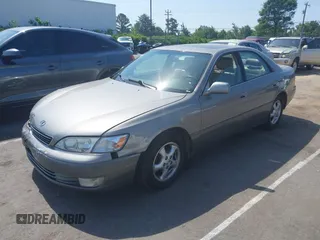 1998 Lexus ES 300 with VIN JT8BF28G3W5031533, listed as a IAAI auction lot 42132801 with 243,178 mi miles and . Bid and sale history available at DreamBid. Image 2.