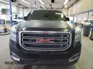 2015 GMC Yukon SLE with VIN 1GKS2AKC6FR229744, listed as a Copart auction lot 88270295 with 215,762 mi miles and Salvage Title. Bid and sale history available at DreamBid. Image 5.