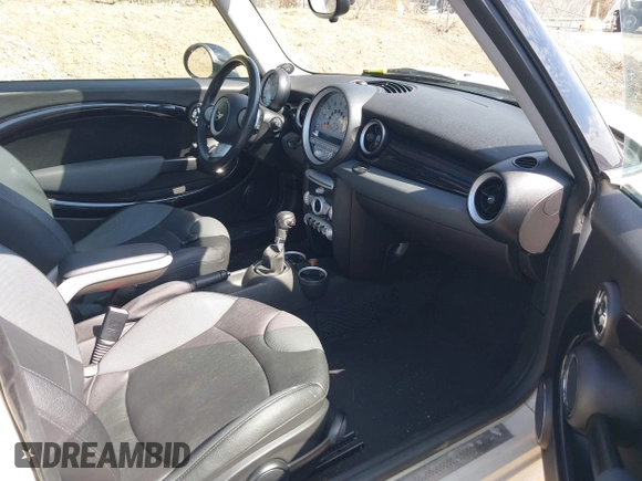 2010 MINI Hardtop S with VIN WMWMF7C55ATZ71881, listed as a IAAI auction lot 41893555 with 77,953 mi miles and . Bid and sale history available at DreamBid. Image 5.