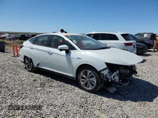 2018 Honda Clarity Plug-In Hybrid with VIN JHMZC5F19JC022895, listed as a Copart auction lot 59470014 with 56,930 mi miles and Salvage Title. Bid and sale history available at carsss.com. Image 4.
