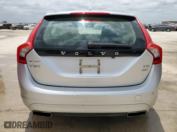 2015 Volvo V60 z VIN YV1612SC1F1191466, wystawiony jako Copart lot #64906184 z przebiegiem 89 444 mil mil oraz Szkoda całkowita • Salvage title. Historia ofert i sprzedaży dostępna na DreamBid. Obrazek 6.