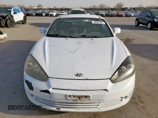 2007 Hyundai Tiburon GS z VIN KMHHM66D27U260421, wystawiony jako Copart lot #48982505 z przebiegiem 100 045 mil mil oraz Tytuł czysty. Historia ofert i sprzedaży dostępna na DreamBid. Obrazek 5.