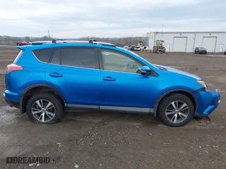 2017 Toyota RAV4 XLE with VIN JTMRFREV8HJ117393, listed as a IAAI auction lot 41676036 with 176,027 mi miles. Bid and sale history available at carsss.com. Image 14.