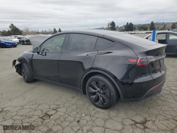 2025 Tesla Model Y Long Range with VIN 7SAYGDEE6SF308226, listed as a Copart auction lot 48006865 with 2,291 mi miles and Salvage Title. Bid and sale history available at carsss.com. Image 2.