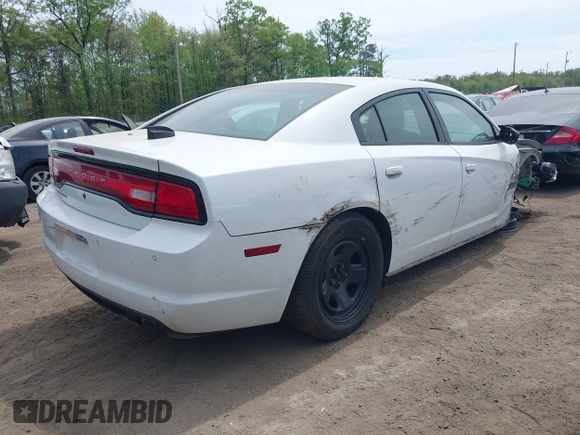 2014 Dodge Charger Police with VIN 2C3CDXAT8EH216267, listed as a IAAI auction lot 42104131 with 116,299 mi miles and . Bid and sale history available at DreamBid. Image 4.