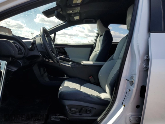 2023 Subaru Solterra Limited with VIN JTMABABA0PA004807, listed as a Copart auction lot 50586815 with 10,879 mi miles and Salvage Title. Bid and sale history available at DreamBid. Image 7.