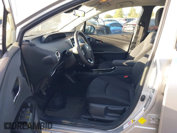 2022 Toyota Prius LE z VIN JTDKAMFP8N3211485, wystawiony jako IAAI lot #42515220 z przebiegiem 23 875 mil mil oraz . Historia ofert i sprzedaży dostępna na DreamBid. Obrazek 5.