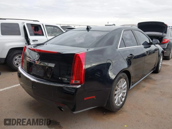 2010 Cadillac CTS with VIN 1G6DA5EGXA0138568, listed as a IAAI auction lot 41354741 with 173,253 mi miles and . Bid and sale history available at DreamBid. Image 4.