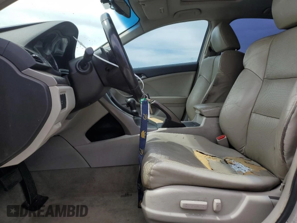 2010 Acura TSX с VIN JH4CU2F68AC043475, выставлен на аукционе Copart как лот 52312805 с пробегом 209 958 миль миль и Списание • Salvage title. История ставок и продаж доступна на DreamBid. Изображение 7.