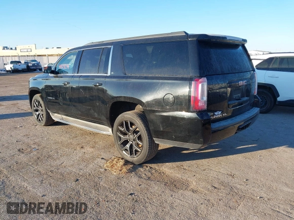 2015 GMC Yukon XL SLT with VIN 1GKS1HKC3FR250207, listed as a IAAI auction lot 41424234 with 183,233 mi miles. Bid and sale history available at carsss.com. Image 3.