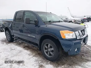 2015 Nissan Titan SV z VIN 1N6AA0ECXFN507260, wystawiony jako IAAI lot #41203612 z przebiegiem 103 000 mil mil oraz . Historia ofert i sprzedaży dostępna na DreamBid. Obrazek 1.