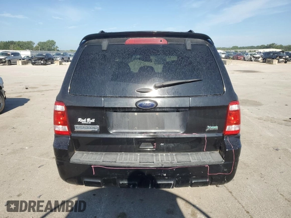 2011 Ford Escape XLT с VIN 1FMCU9DG5BKB65171, выставлен на аукционе Copart как лот 63237785 с пробегом 195 141 миль миль и Списание • Salvage title. История ставок и продаж доступна на DreamBid. Изображение 6.