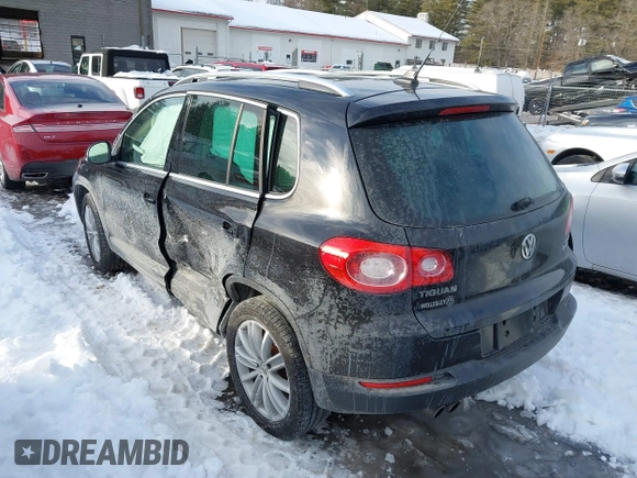 2011 Volkswagen Tiguan SE with VIN WVGBV7AX7BW515555, listed as a IAAI auction lot 41627913 with 49,424 mi miles and . Bid and sale history available at DreamBid. Image 3.